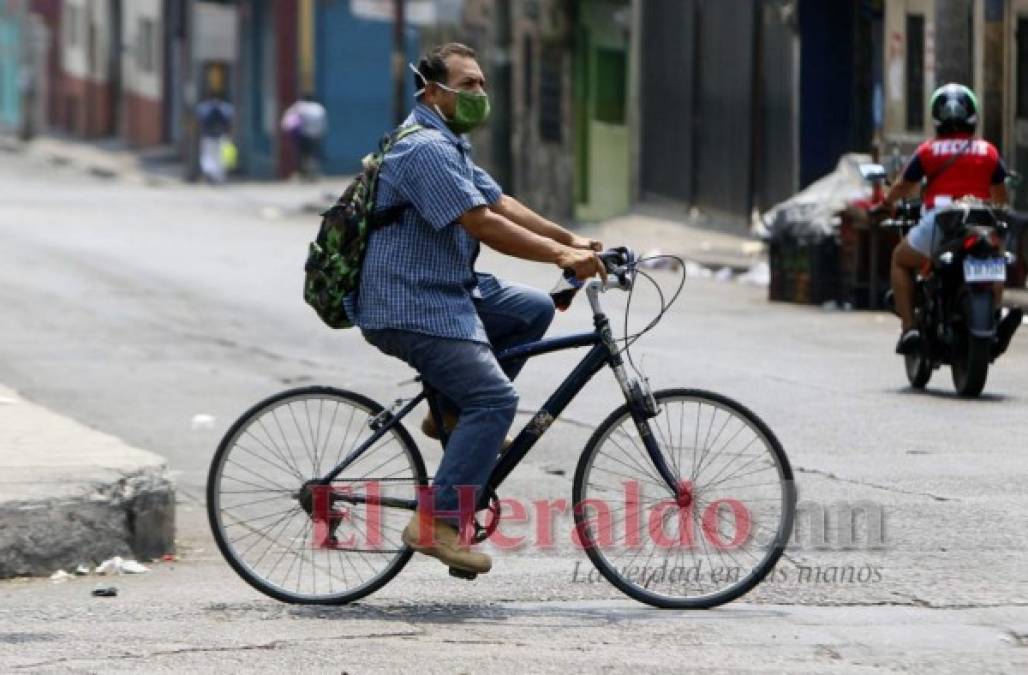 FOTOS: En la capital se resisten al encierro y salen en toque de queda