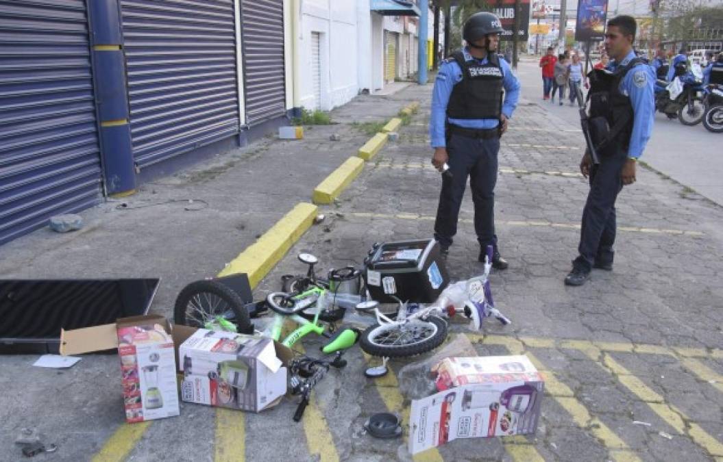 Robos, destrucción y detenidos, las imágenes de los saqueos en San Pedro Sula