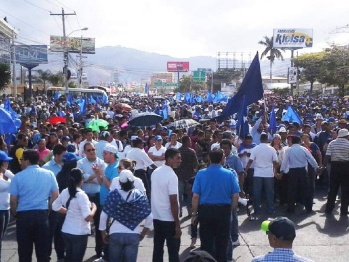 Hondureños marchan en apoyo a JOH