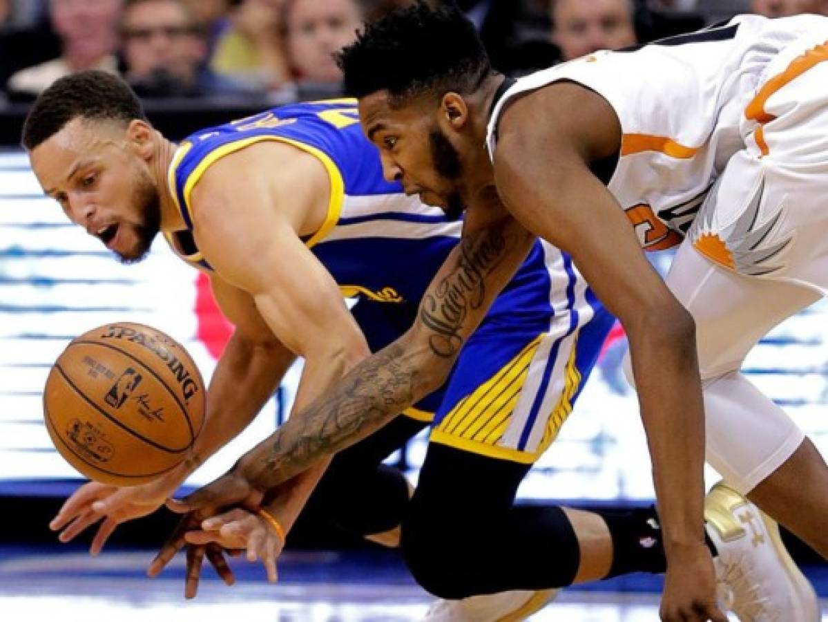 Los Warriors ganan a los Suns y se coronan en el oeste   