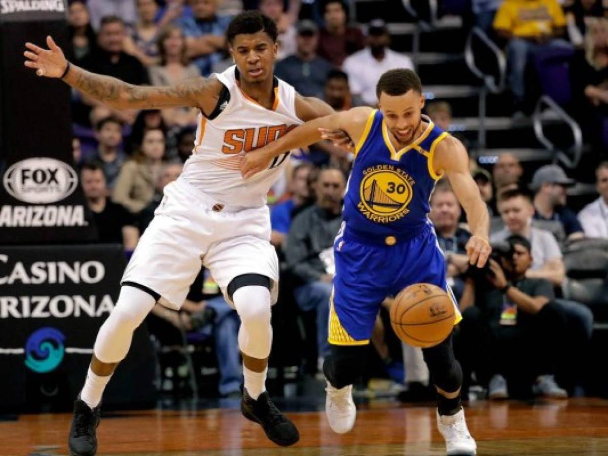 Los Warriors ganan a los Suns y se coronan en el oeste   