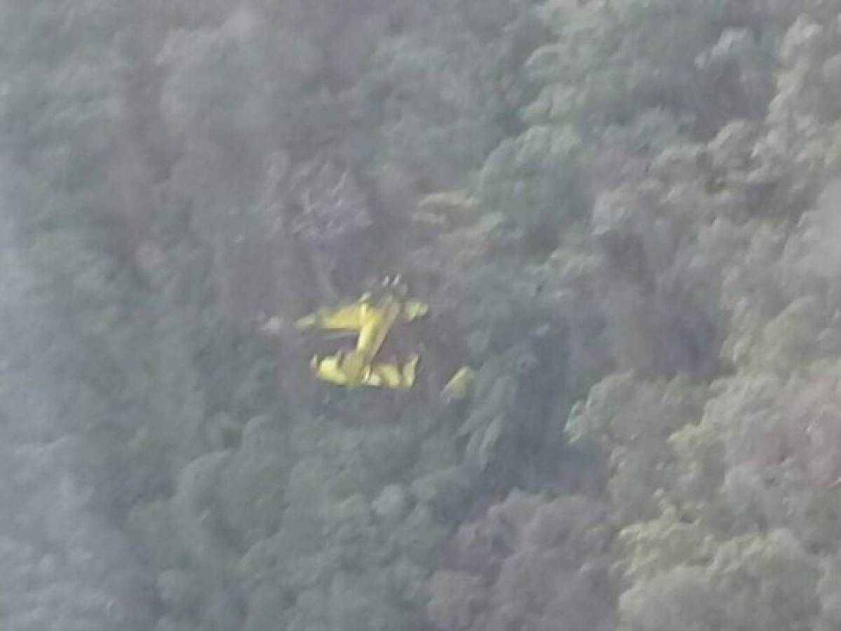Encuentran nave fumigadora que había desaparecido en la zona boscosa del Lago de Yojoa en Honduras