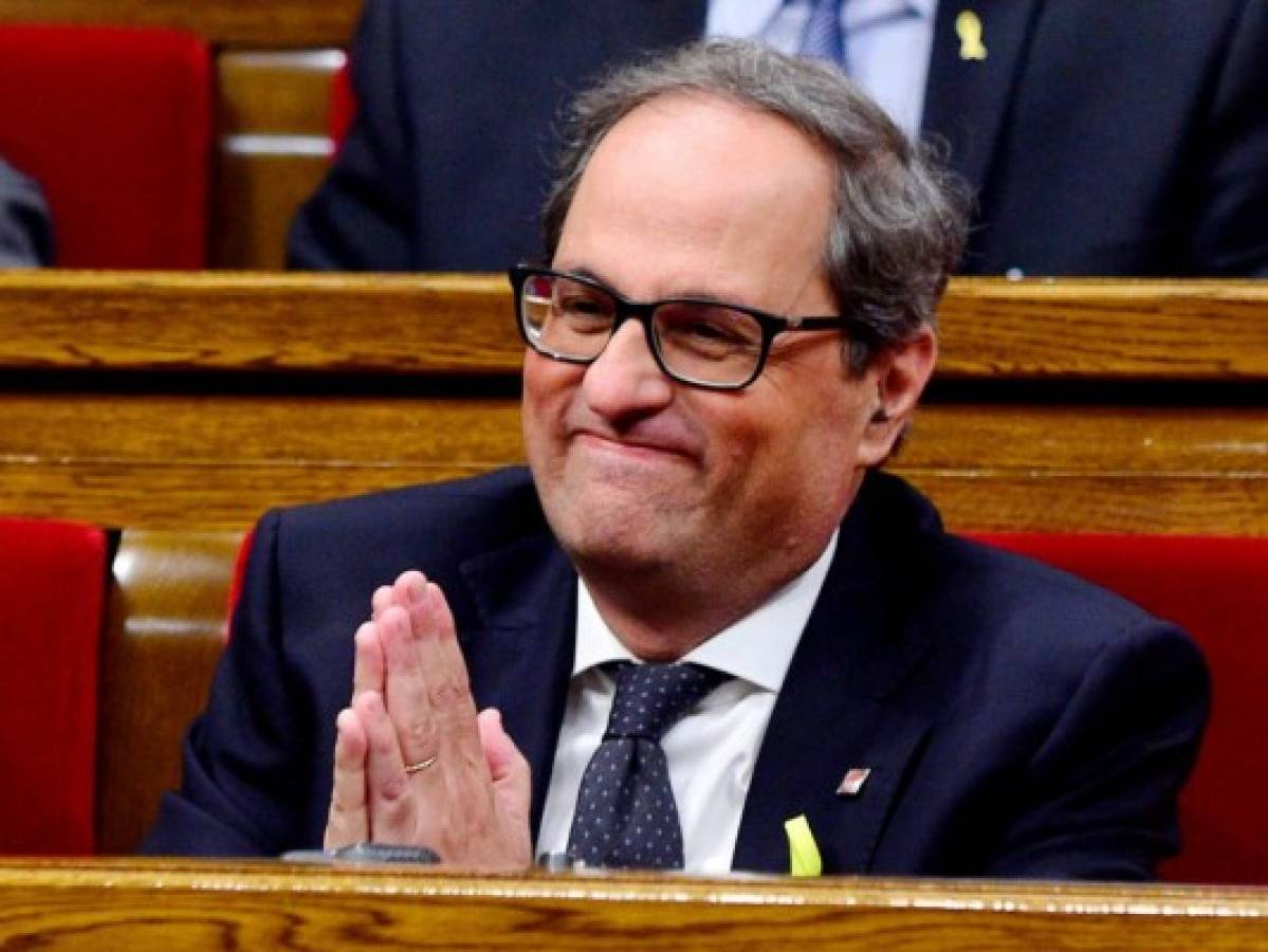 Cataluña inviste como presidente a un independentista del ala dura fiel a Puigdemont