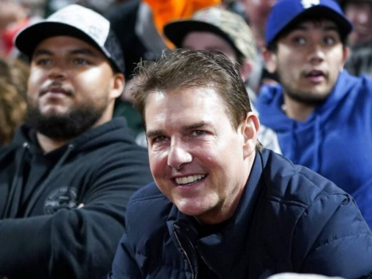 Actor Tom Cruise smiles during Game 2 of a baseball National League Division Series between the San Francisco Giants and the Los Angeles Dodgers Saturday, Oct. 9, 2021, in San Francisco. (AP Photo/Jeff Chiu)