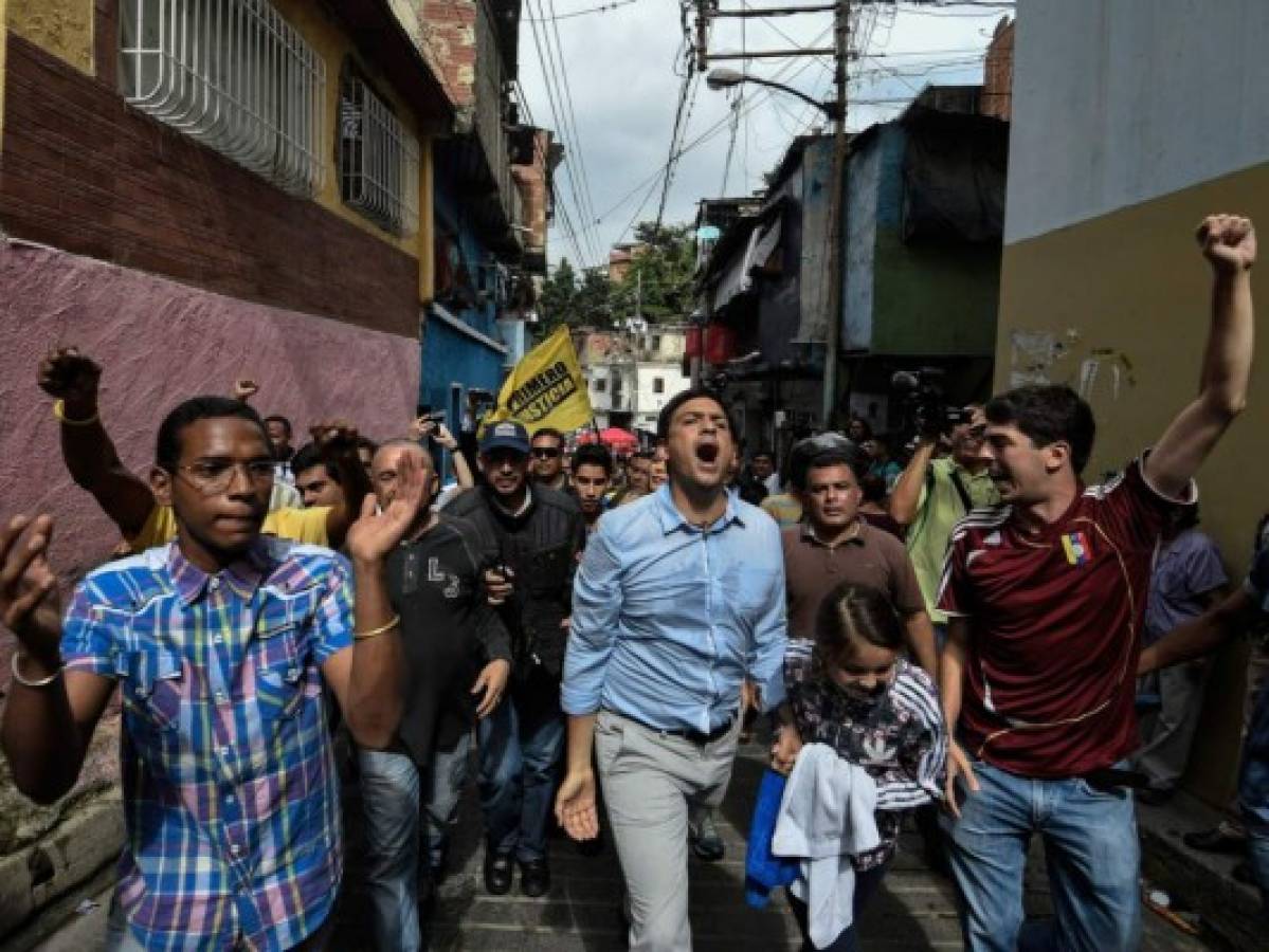 Maduro y oposición se midieron en las urnas tras confrontación en las calles