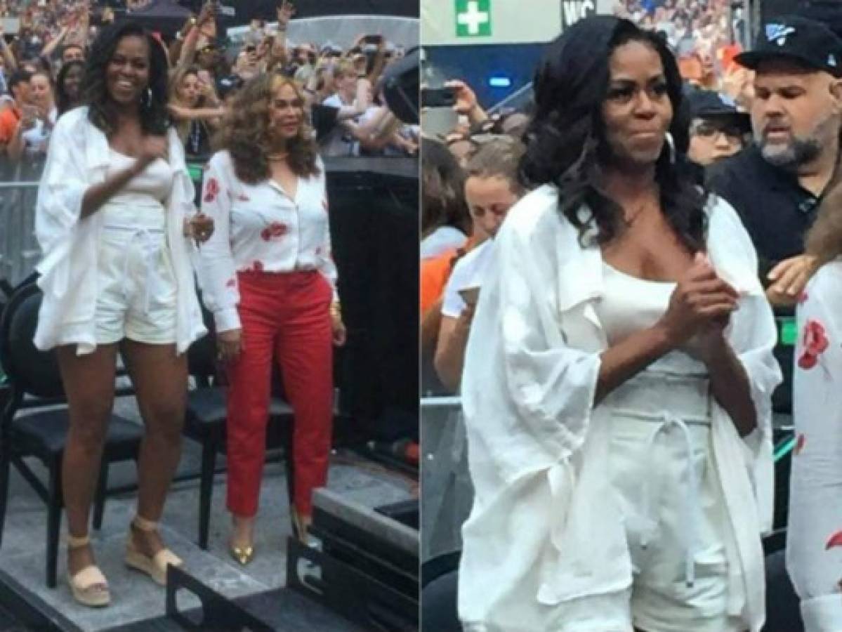 Michelle Obama muestra piernas y escote durante concierto de Beyoncé y Jay-Z en Francia