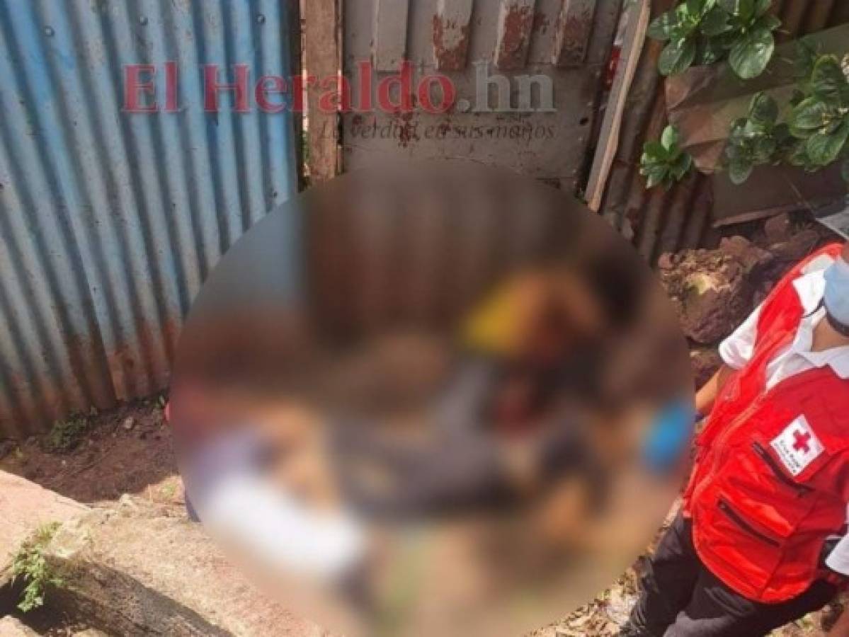 Los cuerpos sin vida de las tres jóvenes quedaron tendidos en una solitaria calle de la colonia Izaguirre. Foto: Alex Pérez | EL HERALDO
