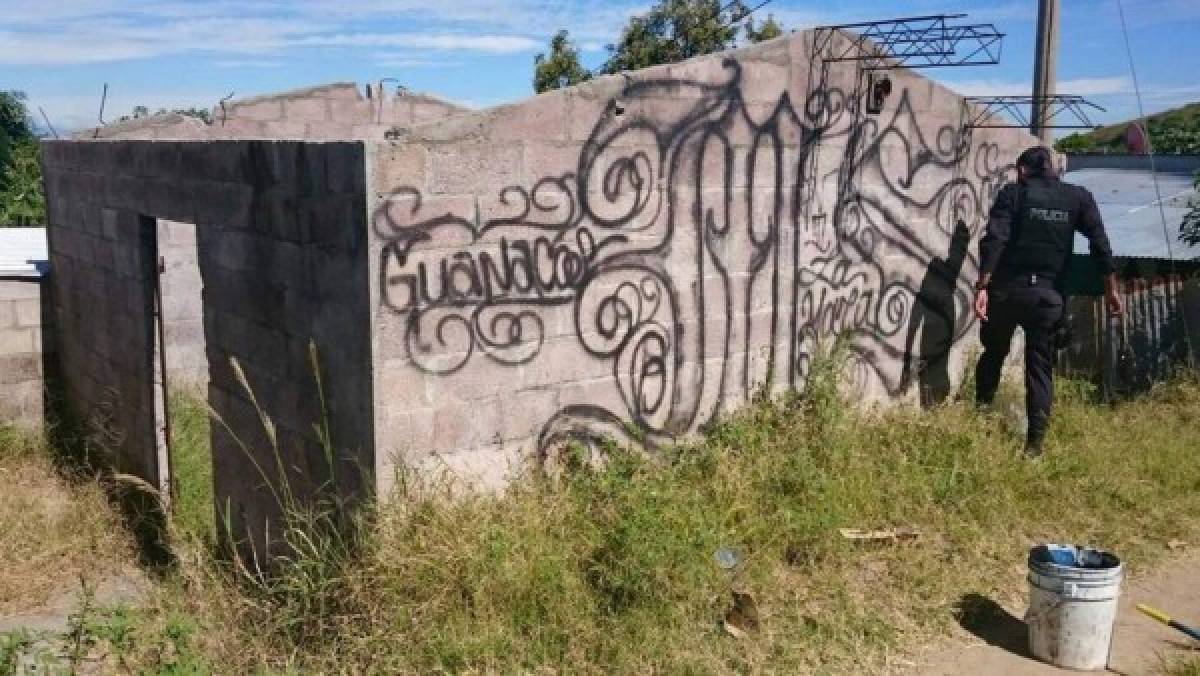 El Salvador borra grafitis de pandillas para combatir violencia