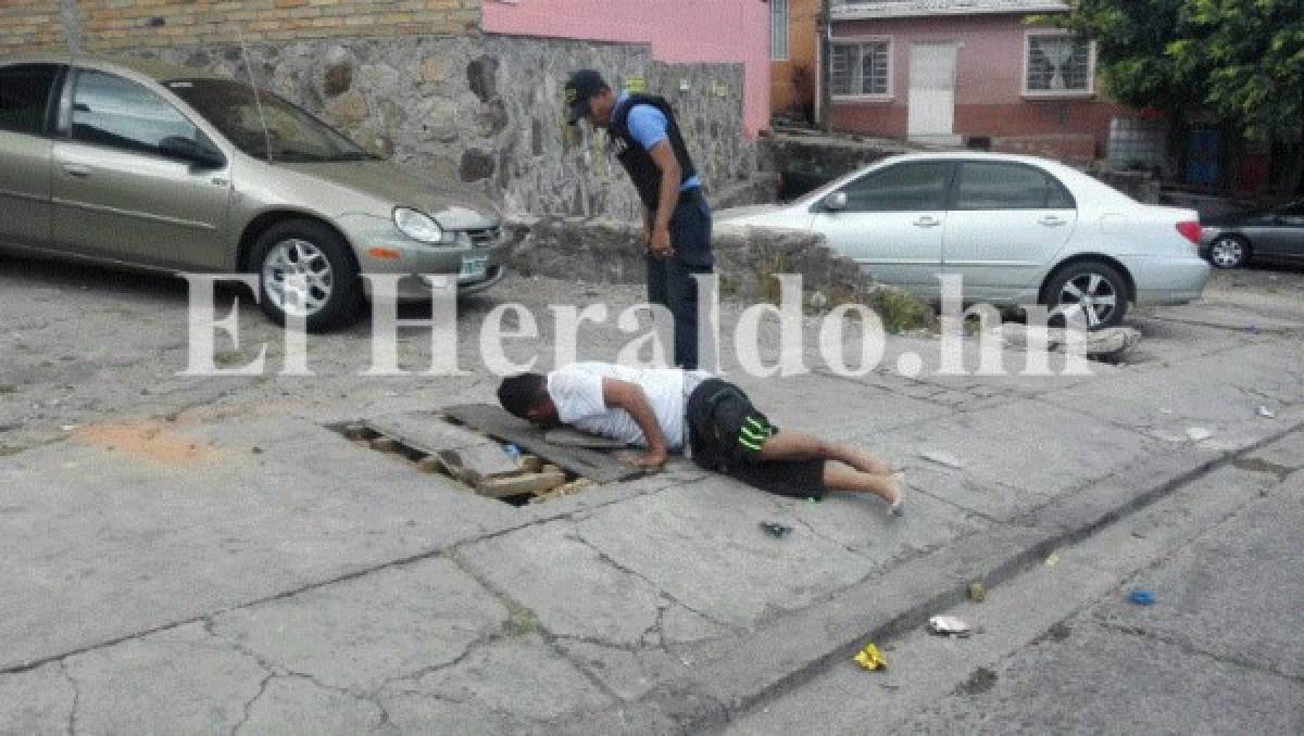 Una persona resultó herida durante el enfrentamiento entre supuestos criminales y policias en la colonia Cerro Grande de la capital de Honduras. Fotos: Estalin Irias/ EL HERALDO