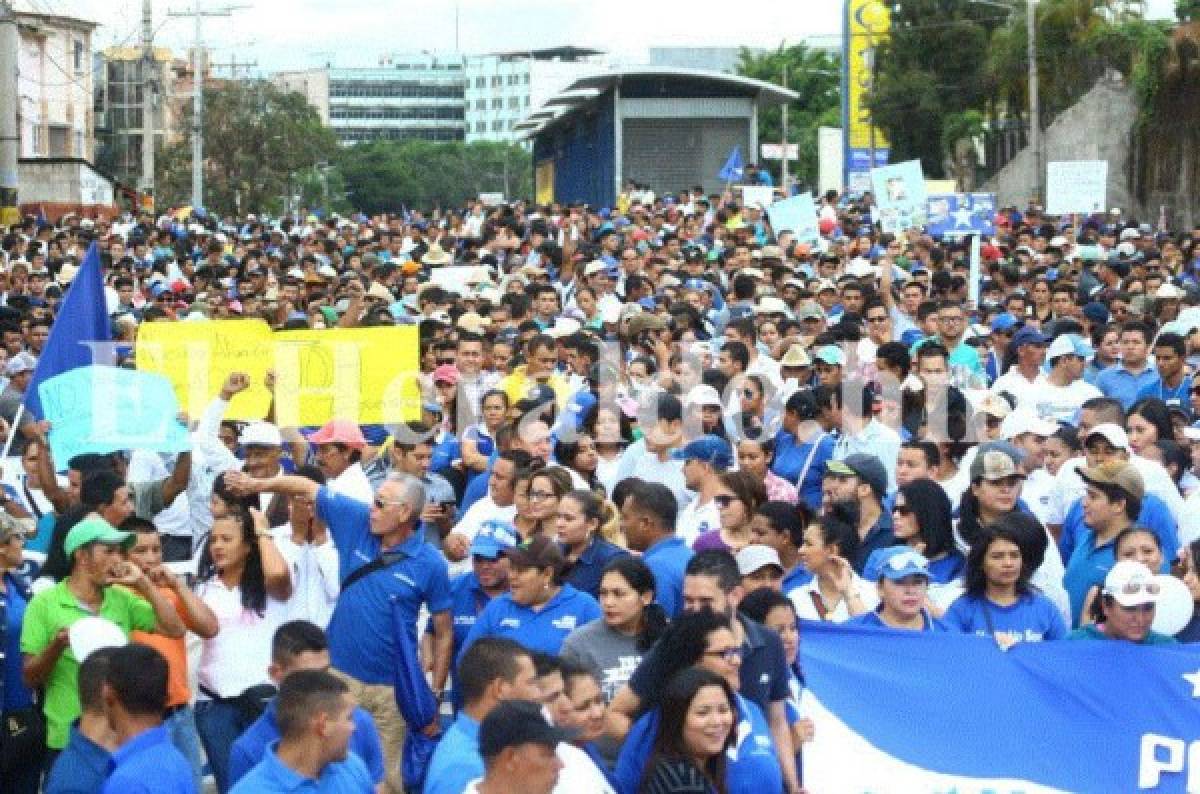 Nacionalistas marchan en apoyo a Juan Orlando Hernández en la capital de Honduras