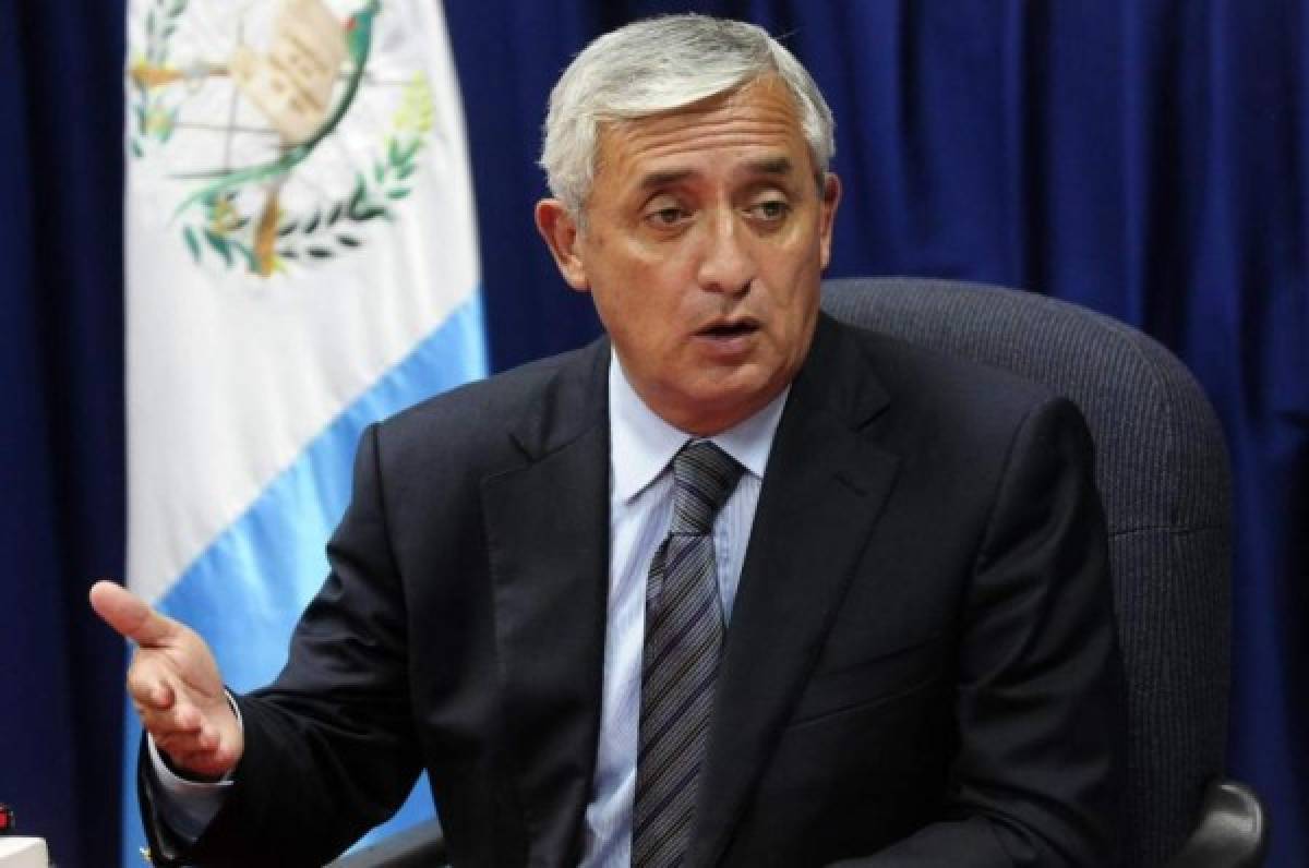 Presidente de Guatemala niega participación en fraude en informe al Congreso