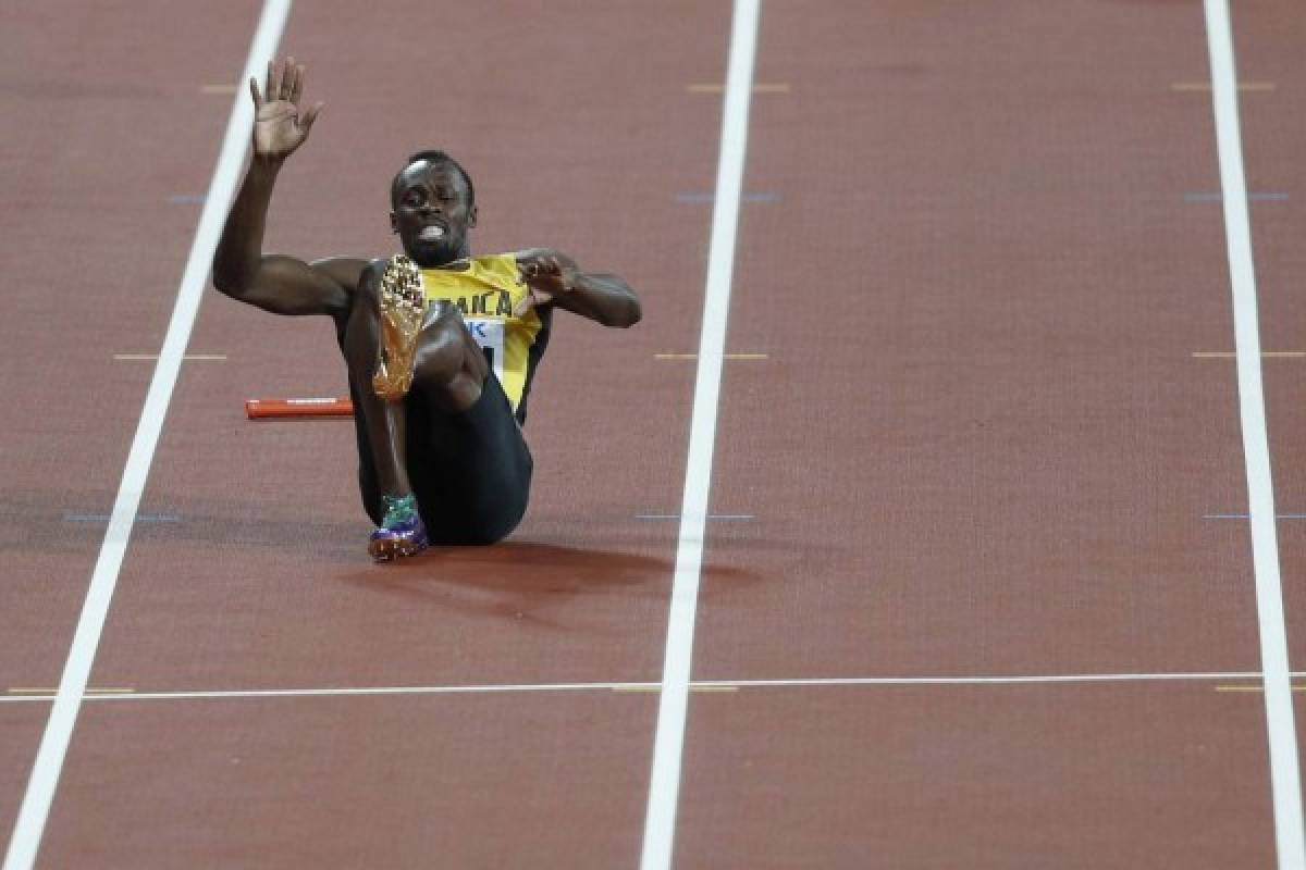 Usain Bolt se lesiona en su última carrera, Gran Bretaña gana el oro mundial en 4x100