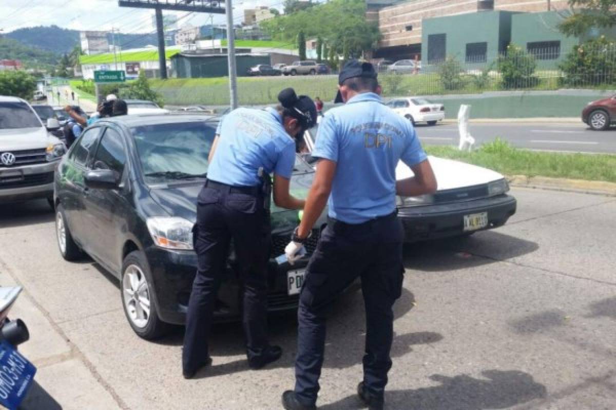 Hallan carro que habrían usado asesinos de conductor de bus rapidito en puente Soberanía de Comayagüela