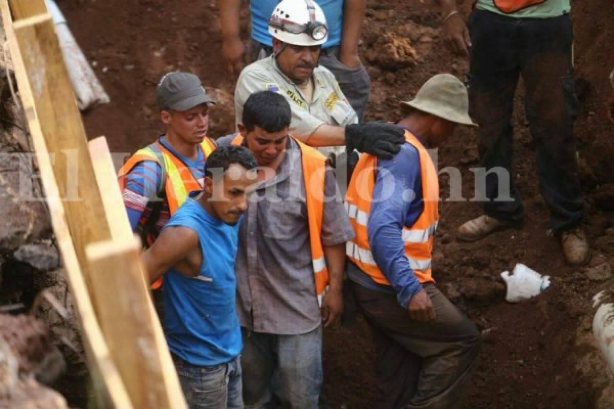 Hallan muertos a los dos obreros soterrados por alud de tierra en la capital de Honduras