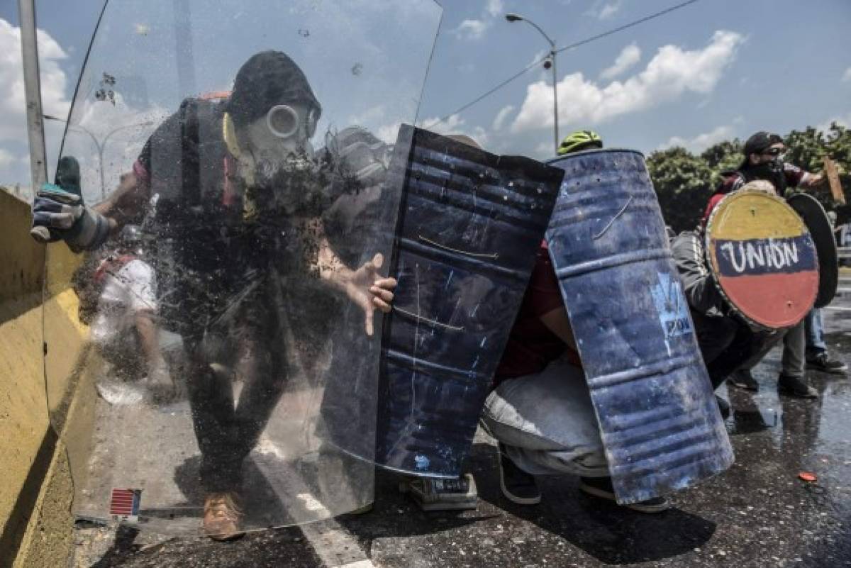 Las protestas llevan casi un mes exigiendo elecciones en esa nación. Foto: AFP