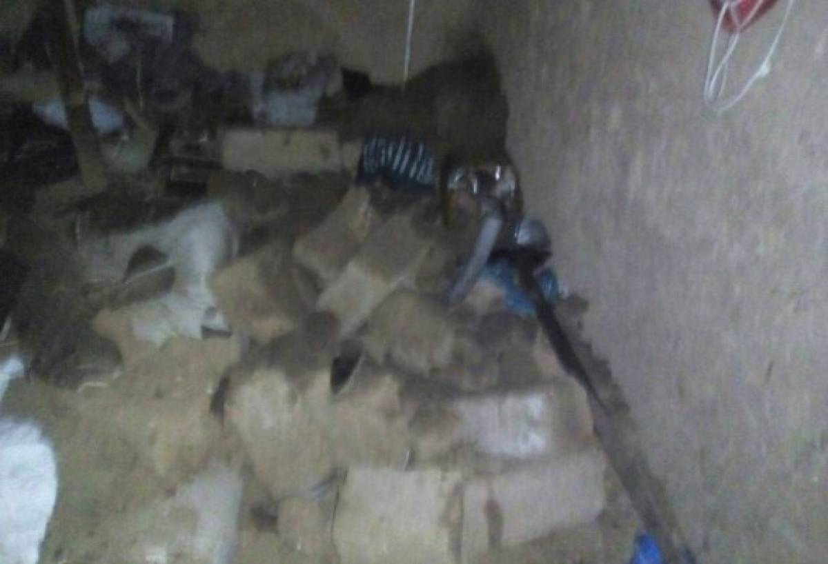 Mujer muere soterrada tras caer roca a su vivienda en la colonia Villanueva de la capital de Honduras