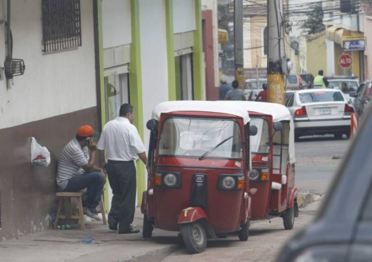 Honduras: Dos adultos y un niño permitirán en las mototaxis