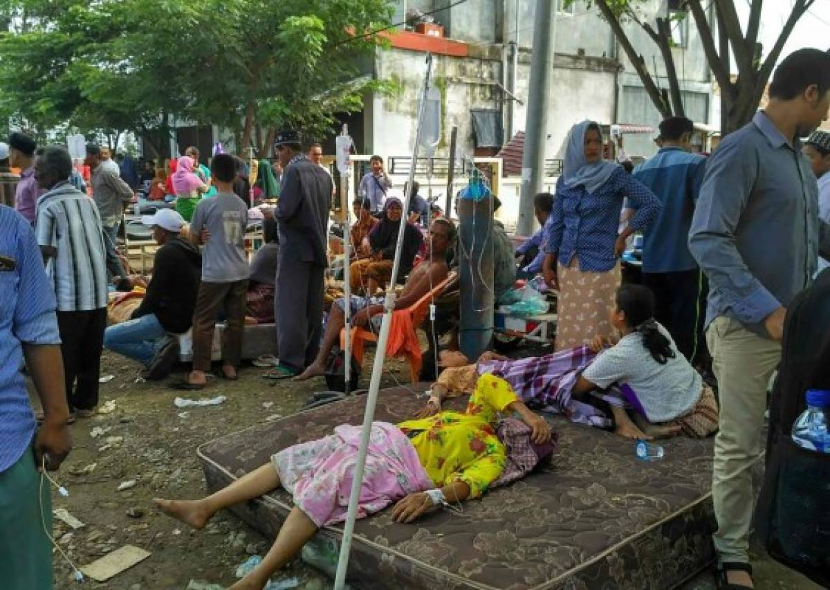 Sismo en Indonesia deja al menos 97 muertos