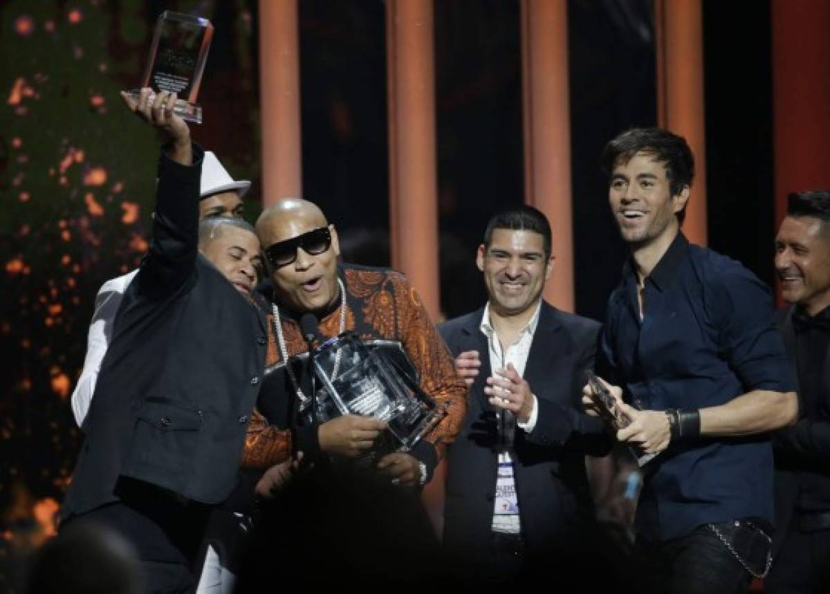 Enrique Iglesias. La exitosa colaboración logró ventas de ocho millones a nivel mundial, siendo la décima canción más vendida de 2014.