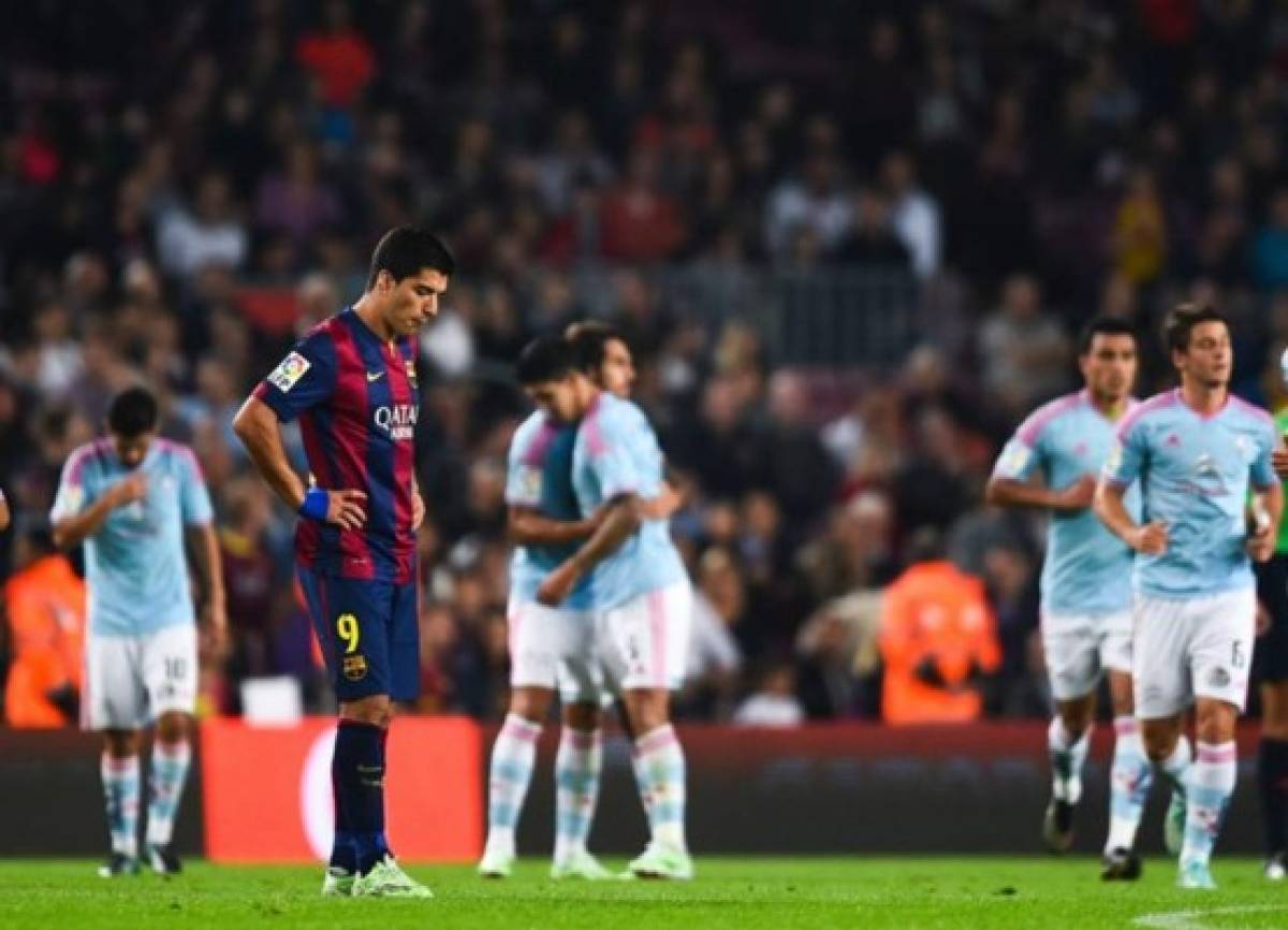 Messi y Suárez permiten al Barcelona mantenerse firme en la punta