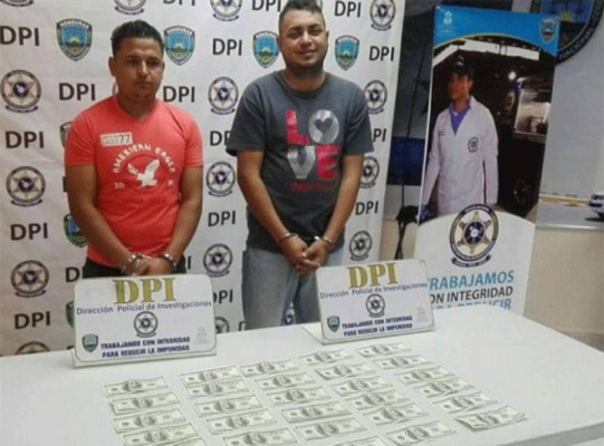 Capturan a dos hondureños con tres mil dólares falsos en la capital
