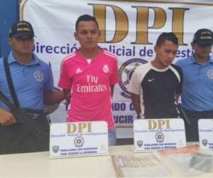 Los dos sujetos fueron presentados a los medios en la sede de la DPI en La Cañada.