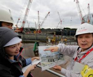 El ministro olímpico Shunichi Suzuki dijo que la construcción avanza según el cronograma establecido y elogió la eficiencia de las obras. Foto: AP