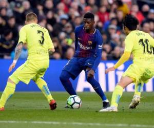 Dembele llegó al FC Barcelona por 105 millones de euros más 42 en variables del Borussia Dortmund. (AFP)