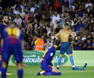 El delantero portugués del Real Madrid, Cristiano Ronaldo, celebró a lo Lionel Messi (Foto: Agencia AFP)