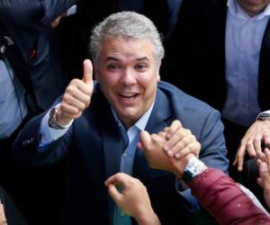 Duque tomará el relevo de Juan Manuel Santos en un momento crítico para el país. Foto: AP
