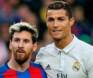 Lionel Messi junto a Cristiano Ronaldo, las dos máximas figuras del fútbol mundial. (AFP)