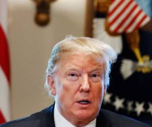 El viernes, Trump retrocedió en sus amenazas previas de acabar con el punto muerto en las negociaciones declarando una emergencia nacional e intentando procurar fondos saltándose el Congreso. Foto: AP