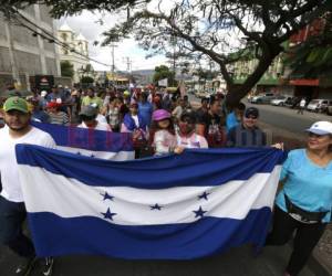 Hondureños marcharon este domingo por el bulevar Morazán en protesta por la cancelación del acuerdo de la Maccih. Foto: Marvin Salgado/ElHeraldo.