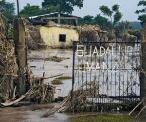 Más de 40,000 personas aún permanecen en albergues en Honduras, al haberse inundado sus viviendas. AFP.