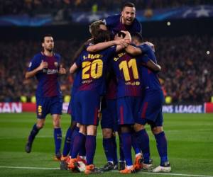 Los jugadores del Barcelona celebran su segundo gol en la Liga de Campeones de la UEFA, en el estadio Camp Nou de Barcelona, el 14 de marzo de 2018, en un partido de fútbol de ida y vuelta entre el FC Barcelona y el Chelsea FC. Foto AFP