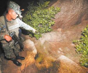 Semienterrados fueron encontrados los cadáveres de dos supuestos guardias de seguridad cerca de la aldea El Tablón.