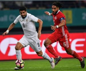 Luis Suárez fue una de las figuras en el duelo Uruguay vs Gales. (AFP)