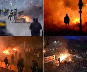 Las protestas de los 'chalecos amarillos' contra Emmanuel Macron degeneraron este sábado en enfrentamientos con la policía en París, con coches y barricadas en llamas, y en escaramuzas en varias ciudades de provincias, a pesar de casi 1,000 detenciones en toda Francia. (Fotos: AFP)