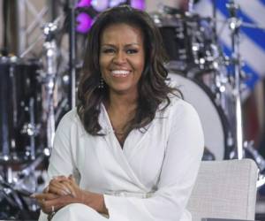Michelle Obama se convirtió en mamá años después. Foto: AP