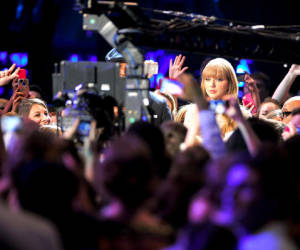 Taylor Swift and LL Cool J co-host the Grammy Nominations Concert from inside the crowd where nominations for the 55th annual Grammy Awards were announced, December 5, 2012 at the Bridgestone Arena in Nashville, Tennessee. The 55th annual Grammy Awards will take place on February 10, 2013 in Los Angeles, California. AFP PHOTO / Christopher Berkey