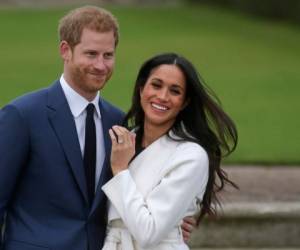 El príncipe Harry y su esposa, Meghan, anunciaron el 8 de enero, para sorpresa general, que renunciaban a sus funciones reales. Foto AFP