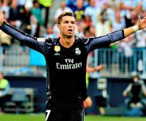 Cristiano Ronaldo marcó el primer gol del Real Madrid para sellar el campeonato ante Málaga. Foto: Agencia AFP / El Heraldo.