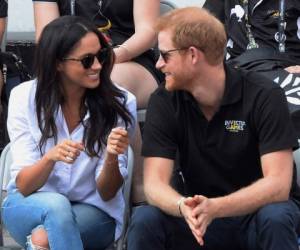 En esta foto de archivo del lunes 25 de septiembre de 2017, el príncipe Harry y su entonces novia Meghan Markle asistieron a un evento de tenis en silla de ruedas en los Juegos Invictus en Toronto.