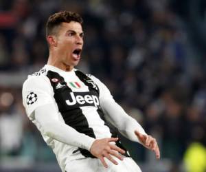 Cristiano Ronaldo, de la Juventus, festeja tras anotar el tercer gol para la victoria 3-0 ante el Atlético de Madrid en el partido de octavos de final de la Liga de Campeones, el martes 12 de marzo de 2019, en Turín (AP Foto/Antonio Calanni)