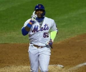 Yoenis Céspedes #52 de los Mets de Nueva York celebra después de hacer un jonrón en la octava entrada contra los Medias Rojas de Boston en el Citi Field el 29 de julio de 2020. Foto: Archivo/AFP