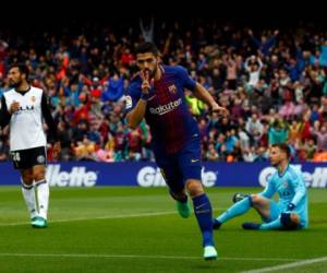 Tanto Suárez como el astro portugués, que no jugó por descanso este fin de semana en la victoria del Real Madrid en Málaga (2-1), quedan a seis goles del 'Pichichi' Leo Messi. Foto AP