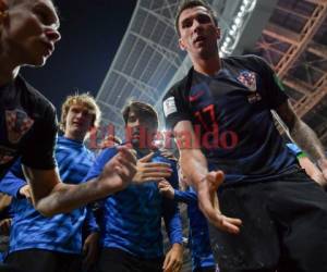Una foto histórica se dio en el partido de Inglaterra y Croacia donde el fotógrafo Yuri Cortez captó este momento. Foto:AFP