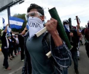 Amnistía Internacional acusó el lunes en un informe al gobierno nicaragüense de usar fuerzas paramilitares, conocida como 'turbas', para reprimir las protesta. Foto: Agencia AFP