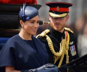 Meghan Markle apareció relajada y sonriente, junto al príncipe Harry. Foto: Agencia AFP