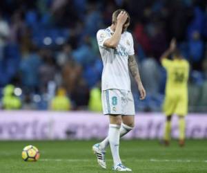 Los blancos, que siguen sin conocer la victoria en Liga en este inicio de 2018, dominaron, pero volvieron a mostrarse sin suerte de cara al gol frente a un Villarreal que fue mucho más efectivo. Foto: AFP